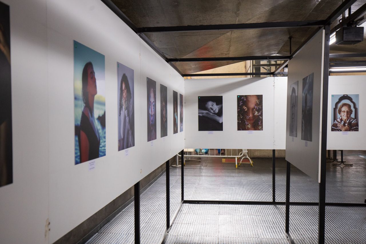 services-04 Experience a modern art exhibition showcasing diverse photography styles in an urban museum.